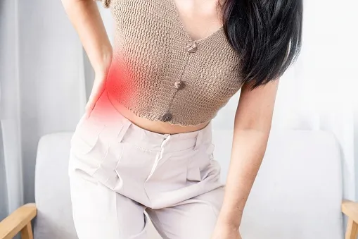 sudden severe lower back pain female